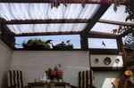 Galerie: Wintergartenbeschattung mit verschiebbaren Sonnensegeln