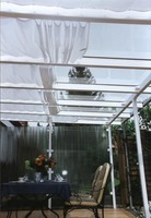 Galerie: Wintergartenbeschattung mit verschiebbaren Sonnensegeln