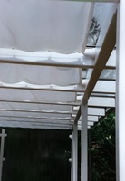 Galerie: Wintergartenbeschattung mit verschiebbaren Sonnensegeln